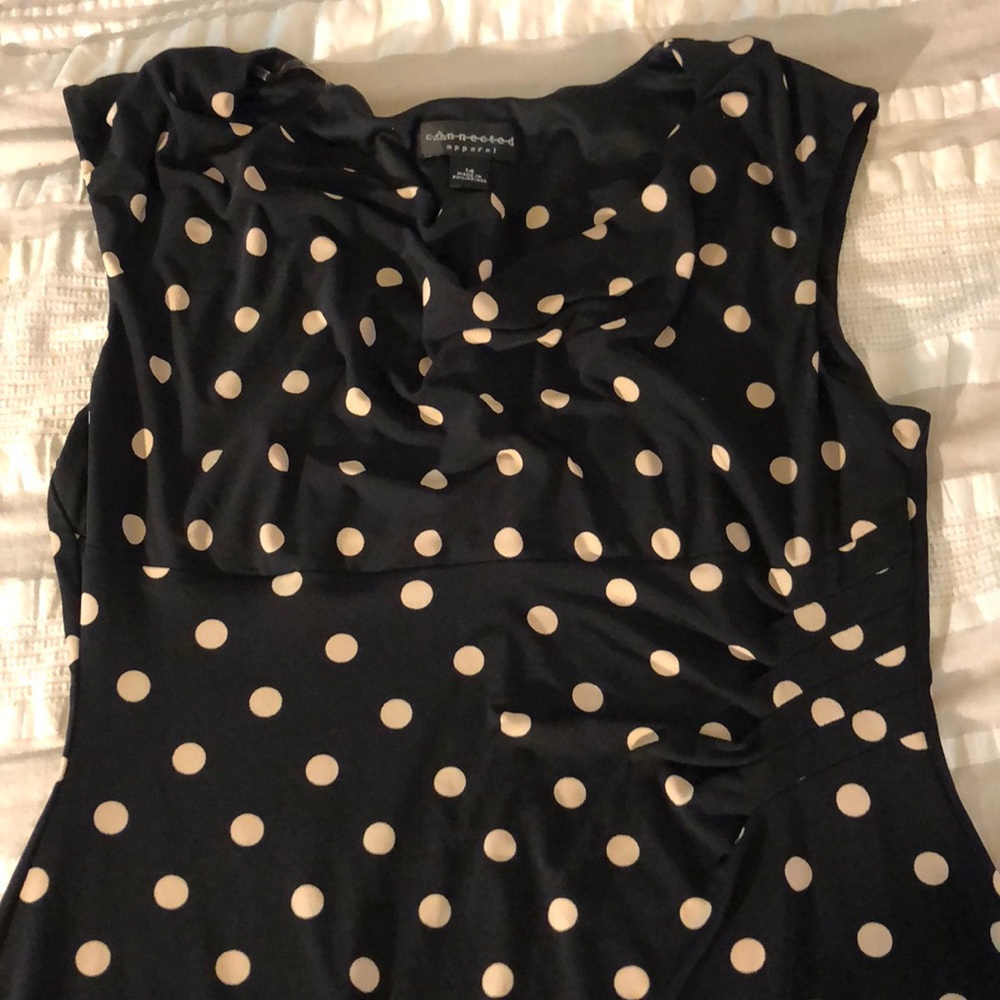 Black fitted dress with cream polka dots